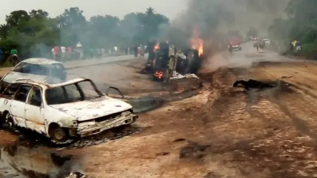 cars burn for di explosion