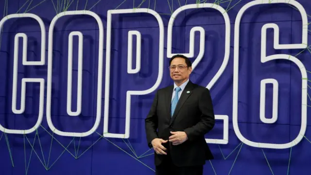 Thủ tướng VN Phạm Minh Chính tại Hội nghị Biến đổi Khí hậu của LHQ COP26 tháng11 /2021 tại Glasgow, Scotland. Chính phủ VN đã cam kết đại phát thải bầng 0 vào năm 2050 tại hội nghị này