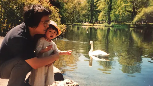 This undated handout photo provided to AFP, courtesy of Angela Gui, on September 22, 2017 shows Angela Gui as a child with and her father Gui Minhai