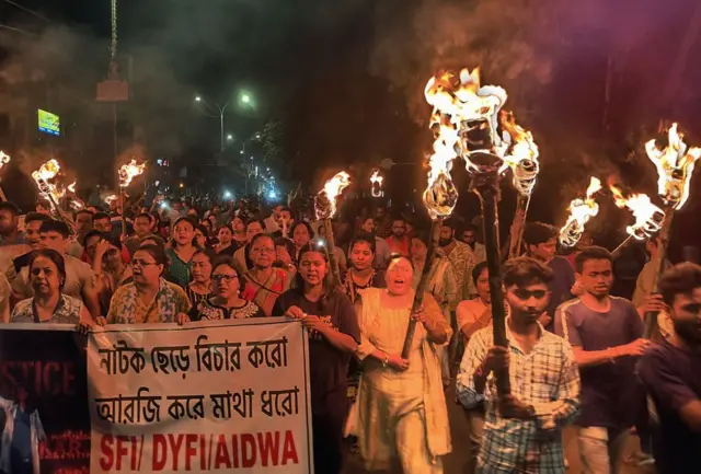 Medical professionals, activists and citizens of Siliguri chant as they take part in a protest march on 14 August 2024 named 'The Night is also ours', to condemn the rape and murder of a young medic