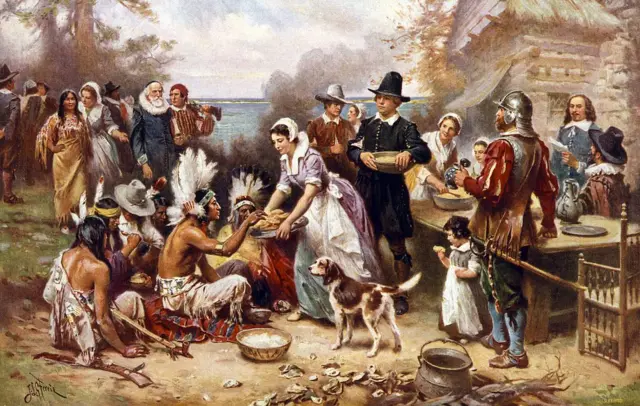 Ilustración que muestra a los peregrinos sirviendo comida a los indígenas americanos en la primera cena de Acción de Gracias en 1621.