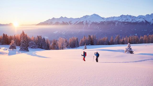 Two skiers on an Austrian slope covered in snow during winter