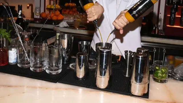 a bartender mixing cocktails.
