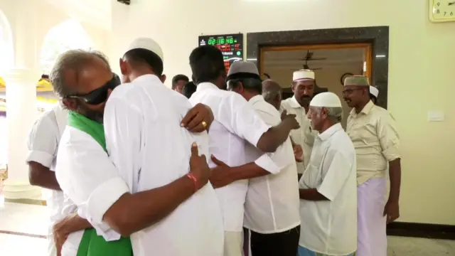 Hindus and Muslims greeting each other