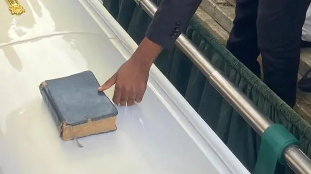 Bible on a casket