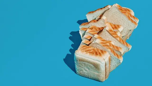 Pão de forma branco, cortado em fatias