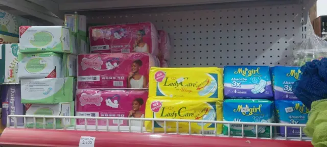 Various types of sanitary pads wey dey on display for sale