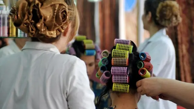 Afghan women getting a new hair style 