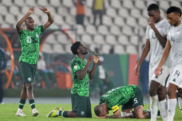 Des joueurs nigerians célébrant leur victoire contre l'Afrique du Sud lors du demi-finale de la CAN 2024