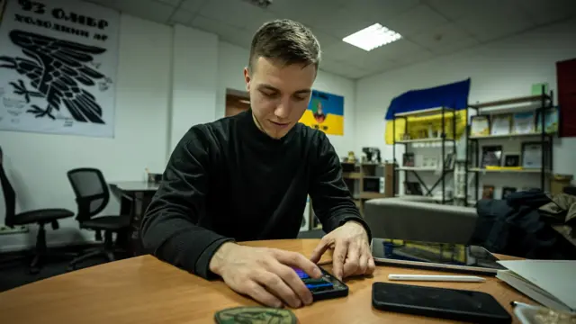 Lawyer and councillor by day, Roman searches for Russian posts on social media by night.