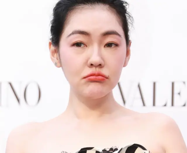 Hostess Dee Hsu attends Valentino Candystud Factory event at Sanlitun on April 26, 2018 in Beijing, China.