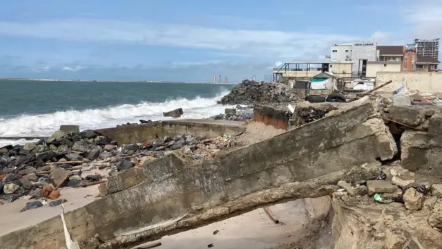 View of the shoreline being submerged in water.