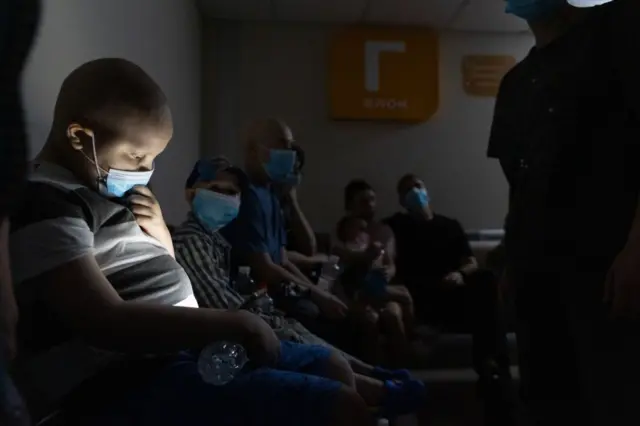 Hospital patients hide in a bomb shelter at the Okhmatdyt Children's Hospital 