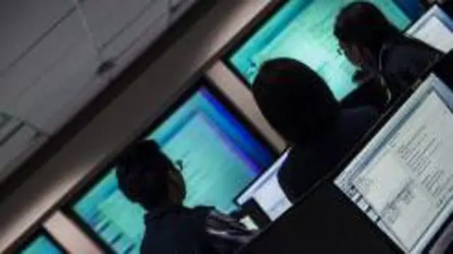 Photo of officials tracing emails