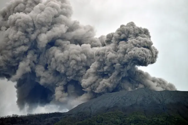 Mount Marapi volcano spews volcanic ash as seen from Nagari Batu Palano in Agam, West Sumatra province, Indonesia on 4 December 2023