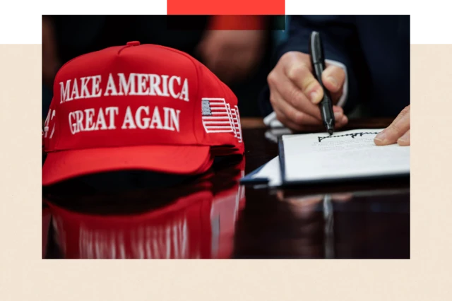 US President Donald Trump signs executive orders in the Oval Office at the White House
