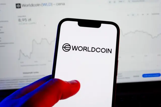 In this photo illustration, a Worldcoin logo seen displayed...
POLAND - 2025/01/11: In this photo illustration, a Worldcoin logo seen displayed on a smartphone. (Photo Illustration by Mateusz Slodkowski/SOPA Images/LightRocket via Getty Images)