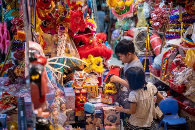 Children buying toys Mid Autumn Festival