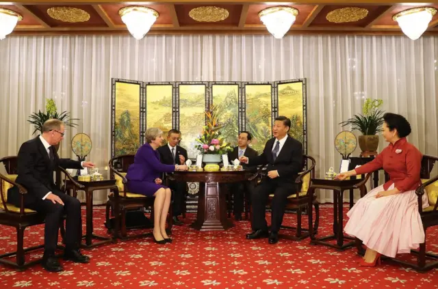 British Prime Minister Theresa May and her husband Philip take part in a Tea Ceremony with Chinese President Xi Jinping and his wife Peng Liyuan at Mr Jinping"s official Diaoyutai State Guesthouse on February 1, 2018 in Beijing, China. Theresa May, who is on a three day visit to China met Chinese President Xi Jinping to discuss matters including the environment, investment, education, Hong Kong and North Korea. (Photo by Dan Kitwood - Pool/Getty Images)