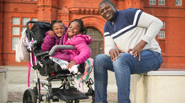 Ibrahima Ndiaye and his daughters Marieme and Ndeye