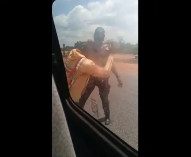 Di video show wia di police officer slap di man for face