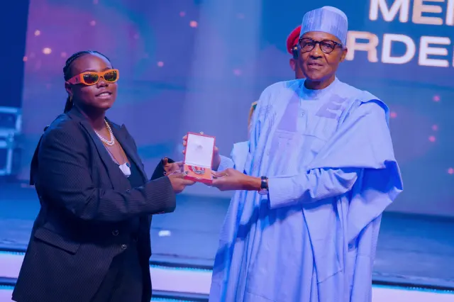 2022 National Honours Award recipient Teni dey collect her award