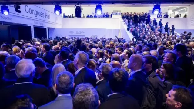 Сотні учасників форуму в Давосі зібралися біля моніторів, щоб послухати промову Трампа