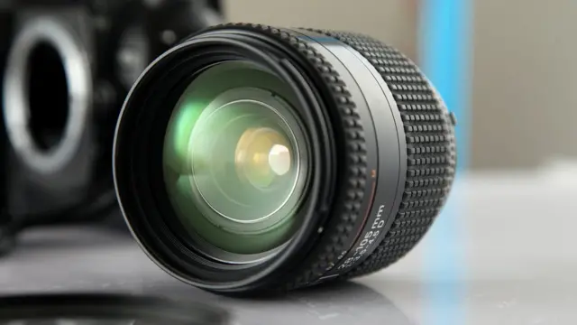 Photo camera lens
