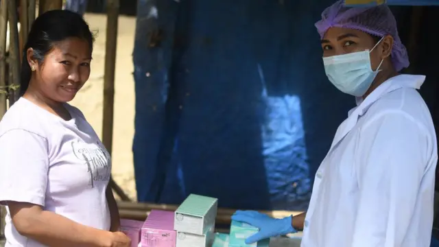 Nurse Shery with contraceptive supplies.