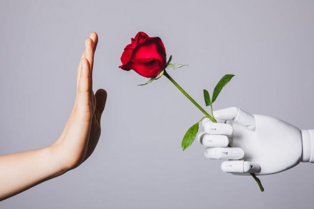 Robô oferecendo uma rosa, e uma mão humana rejeitando
