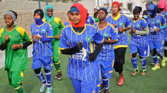 Somali football players of Golden Girls Football Centre, Somalia's first female soccer club, attend their training session at Toyo stadium in Mogadishu,