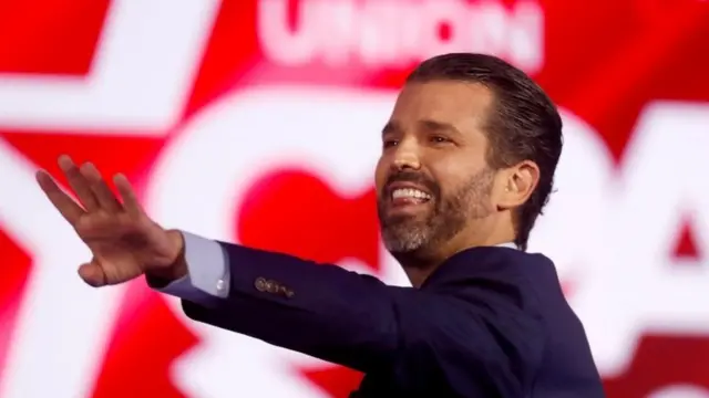Donald Trump Jr. waves to the crowd after speaking at the Conservative Political Action Conference (CPAC) in