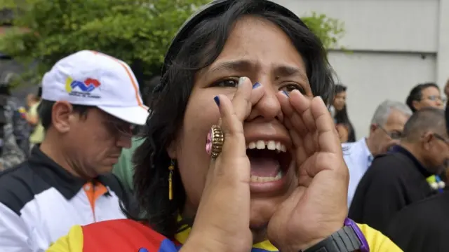 Mujer protesta en Venezuela.