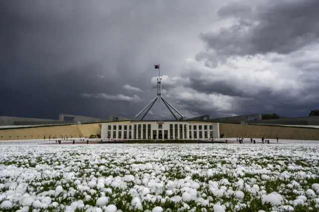 Golf ball-sized hail is shown at Parliament House in Canberra on January 20 - An nuna kankara da ta kai girman kwallon gora a Majalisar dokokin Canberra 20 ga watan Janairu.