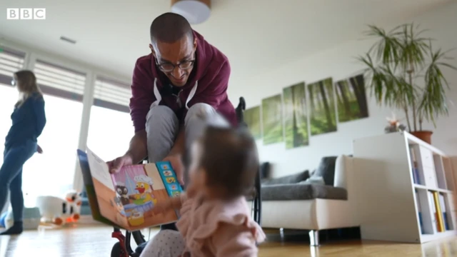 David M'Zee dan anak perempuannya.