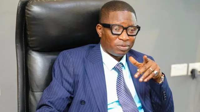 Gifec boss Rashid Tanko-Computer sits in his office