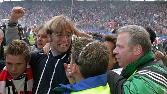 Klopp is mobbed by Mainz fans celebrating their 2004 promotion