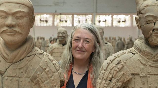 Presenter Mary Beard with 2 Terracotta army sculptures inside the Museum of Qin Terra-cotta Warriors and Horses, X’ian, China