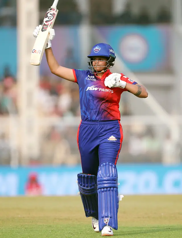 મહિલા ક્રિકેટરની તસવીર