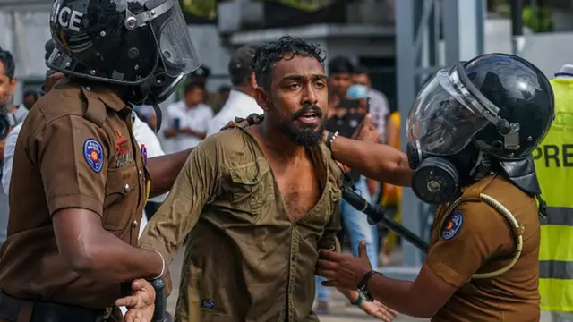 Police use water canon and tear gas to disperse sri lankan university students during a demonstration. August 18, 2022 Colombo, Sri Lanka