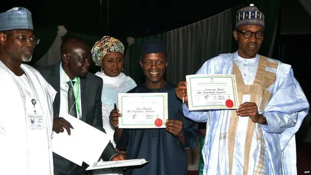 Presido-elect Muhammadu Buhari and Vice presido-elect Yemi Osinbajo collect dia certificate of returns from INEC