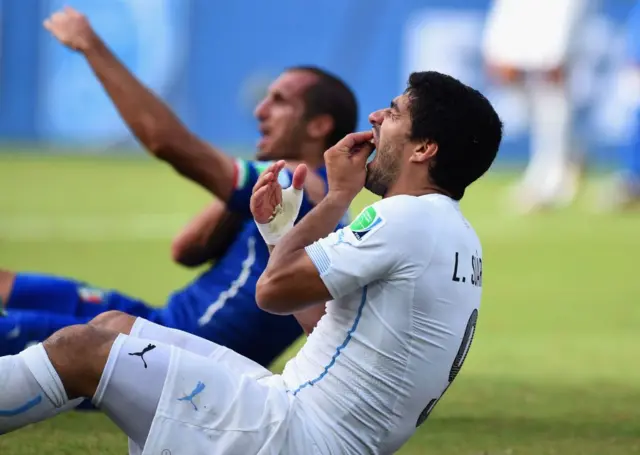 Luis Suárez, Giorgio Chiellini, Piala Dunia 2014