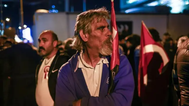 Supporters of Turkish presidential candidate Kemal Kilicdaroglu, leader of the opposition Republican People's Party (CHP), gather in front of CHP's headquarters in Ankara, Turkey, 14 May 2023