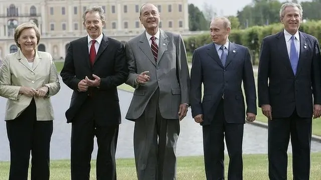 Putin e líderes na reuniçao do G8, em 2006, na Rússia