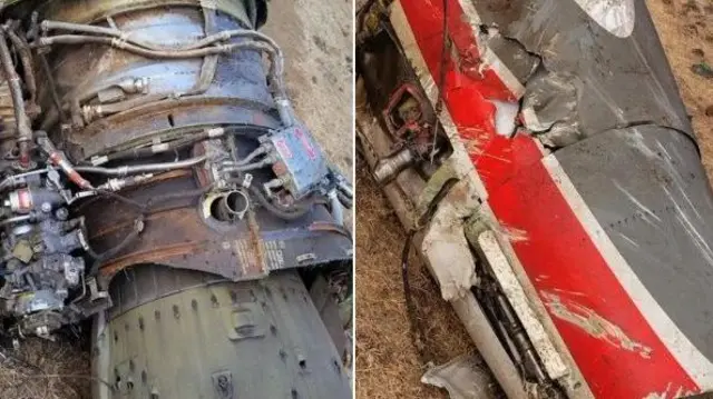 ভেঙে পড়া বিমানটির কিছু অংশ