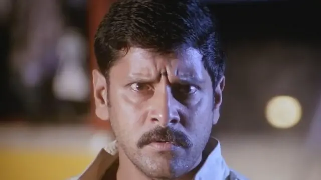 தூள் திரைப்படத்தில் நடிகர் விக்ரம்
