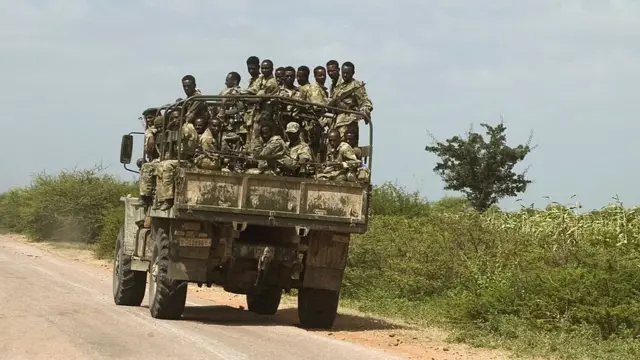 Ethiopian soldiers ride an army vehicle on their way to Mogadishu, 28 December 2006.
