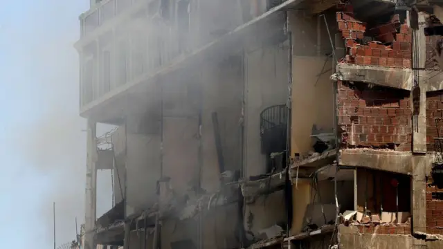 Much of the building's outer wall was torn off by the explosion