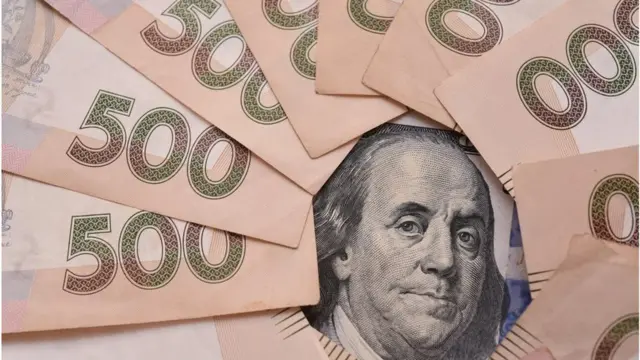 гривня і долар