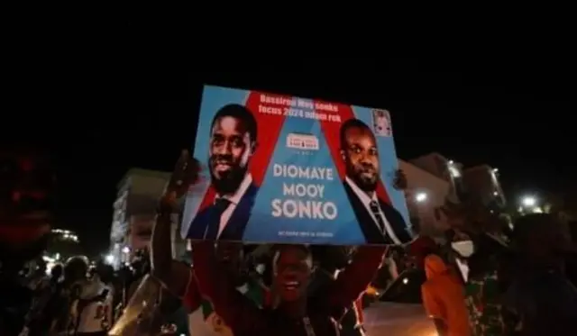 Supporters with placards
